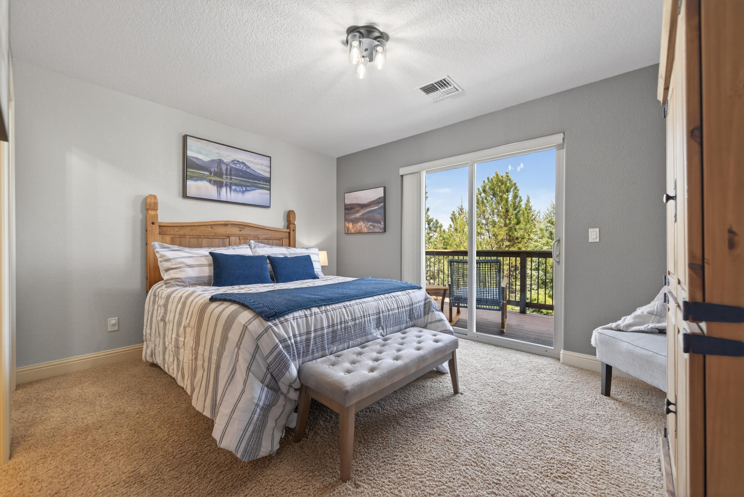 9009 Merlin Drive Redmond, OR 97756 - Photo 49 of 98 a bedroom with a bed and a view of bedroom