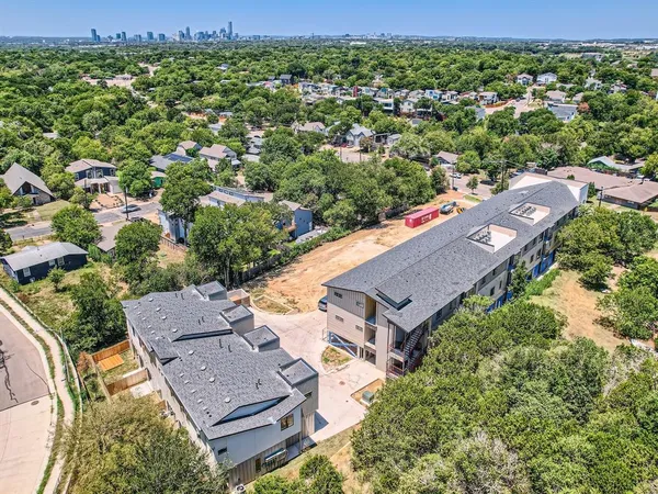 an aerial view of a house with a garden
