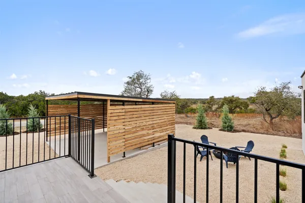 a view of a balcony with an outdoor space