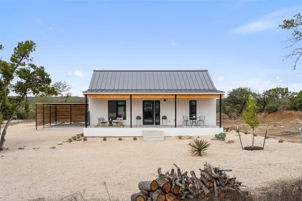 a front view of house with a patio