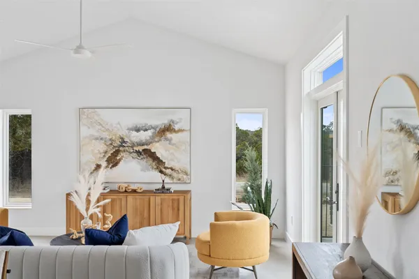 a living room with furniture and a window