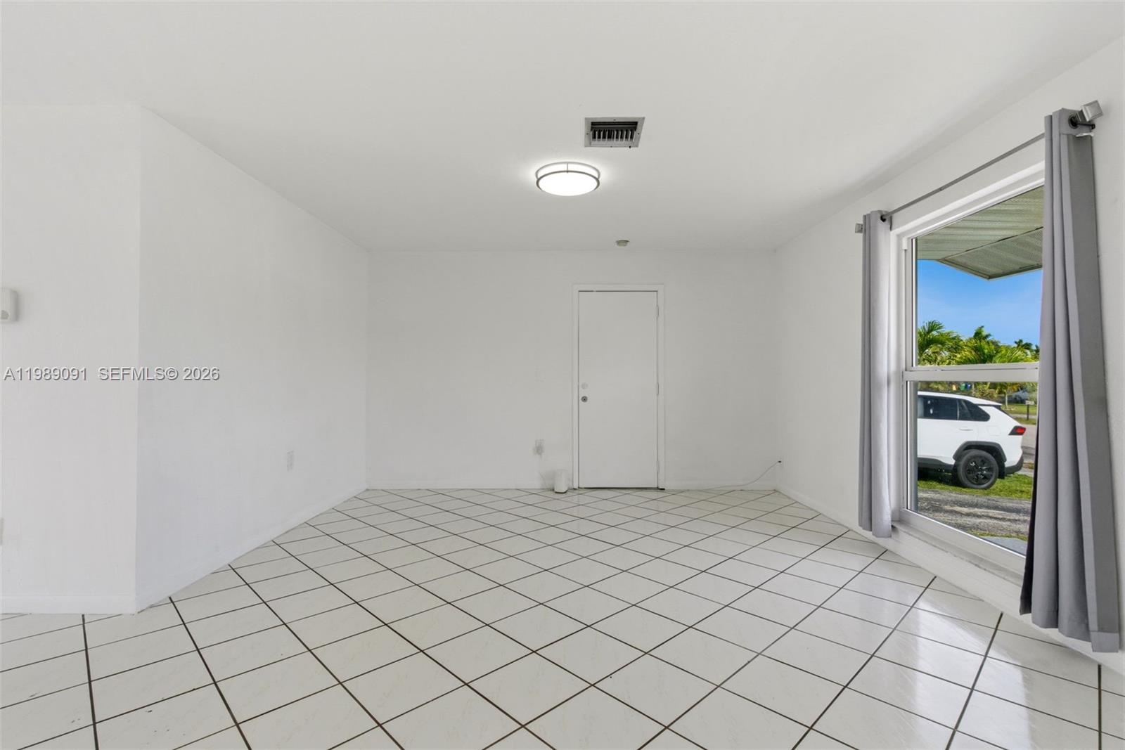 12621 Southwest 264th Street, Unit 1 Homestead, FL 33032 - Photo 5 of 24