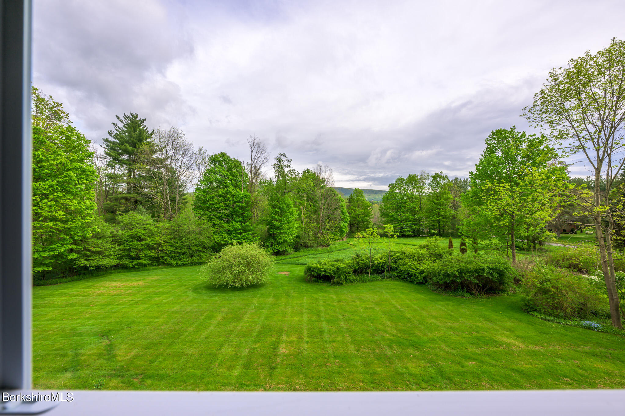 19 Anthony Road Richmond, MA 01201 - Photo 2 of 40 a backyard of a house with lots of green space