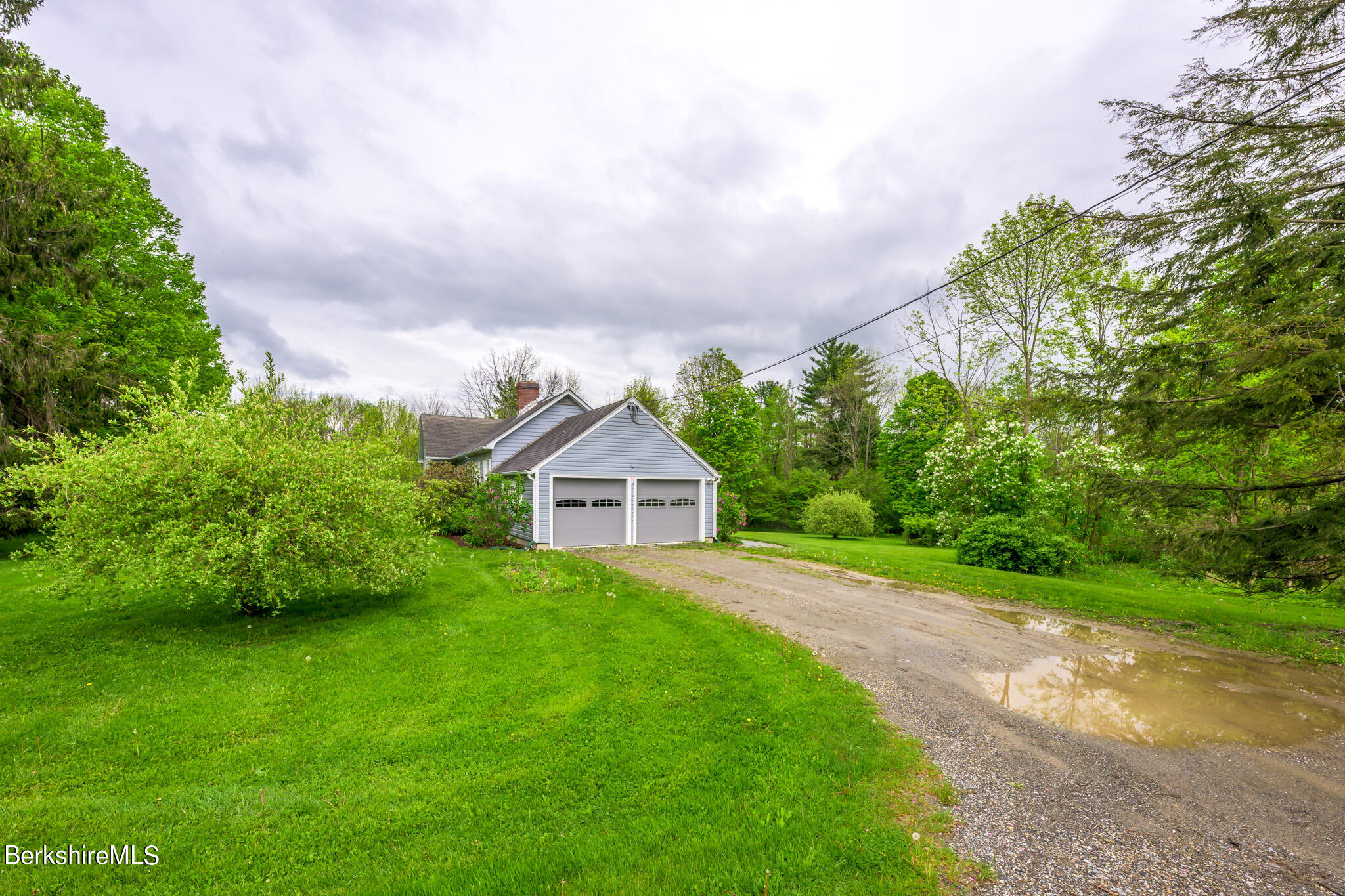19 Anthony Road Richmond, MA 01201 - Photo 28 of 40 a view of a house with a big yard plants and large trees