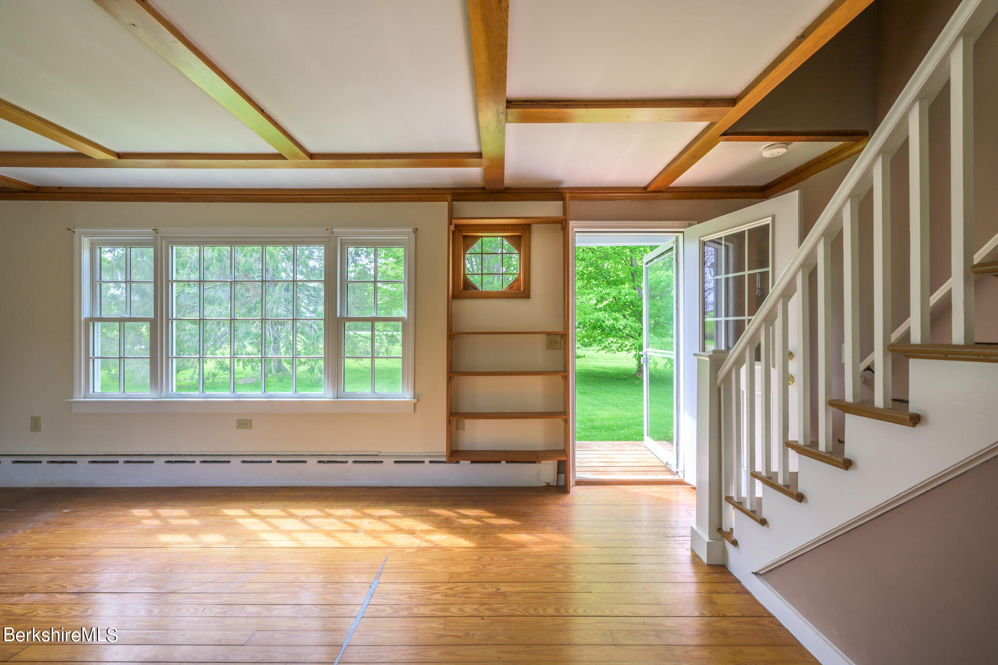 19 Anthony Road Richmond, MA 01201 - Photo 3 of 40 a view of empty room with wooden floor and fan