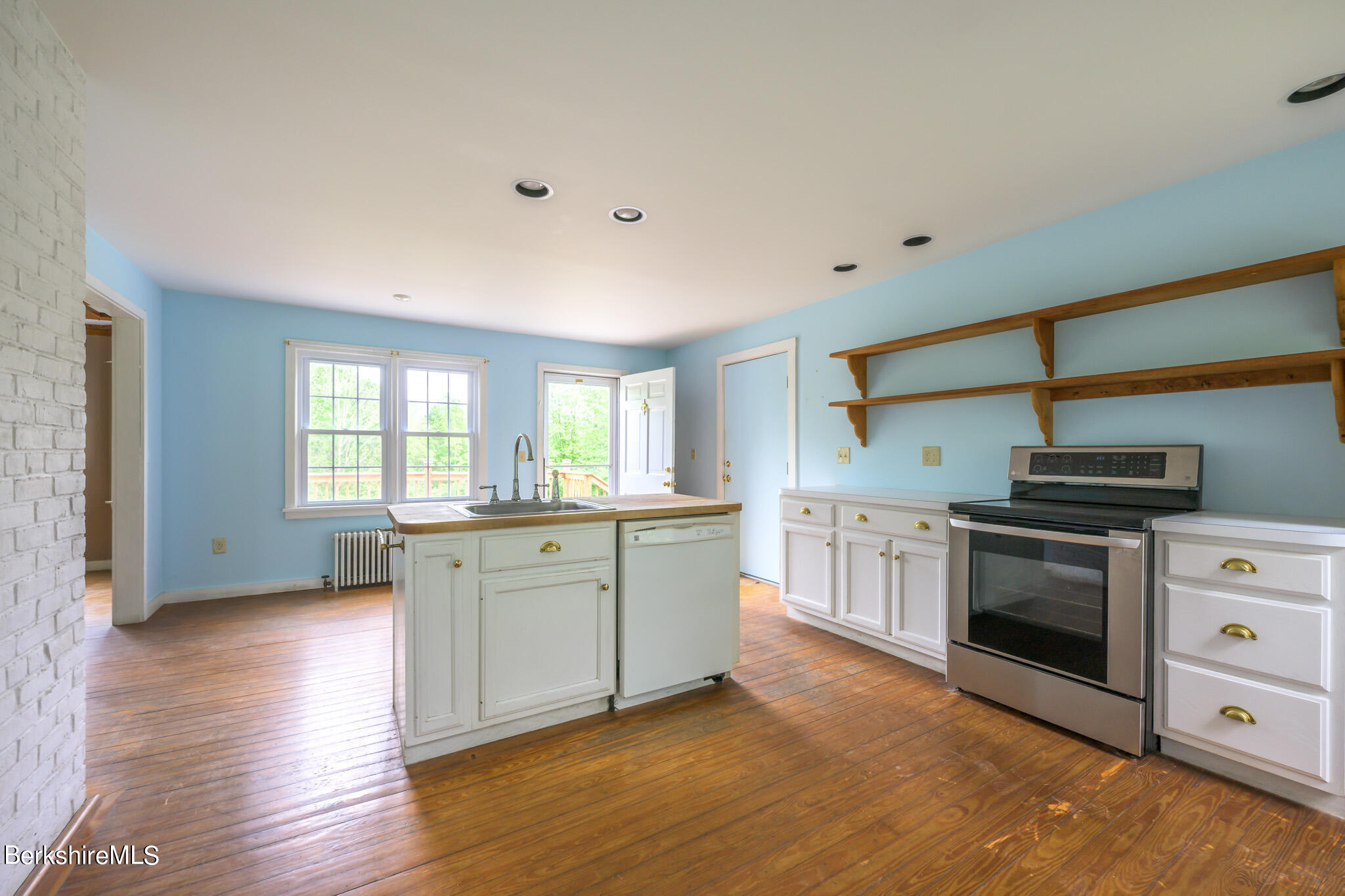 19 Anthony Road Richmond, MA 01201 - Photo 8 of 40 a large kitchen with a stove top oven