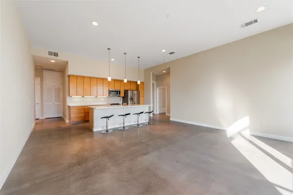 a view of kitchen with furniture and outdoor area