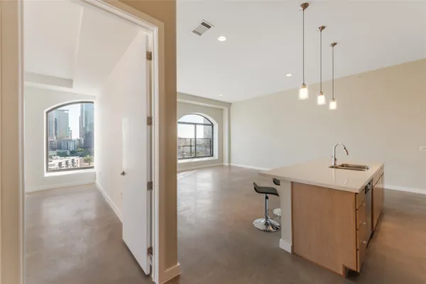 a view of a room with windows