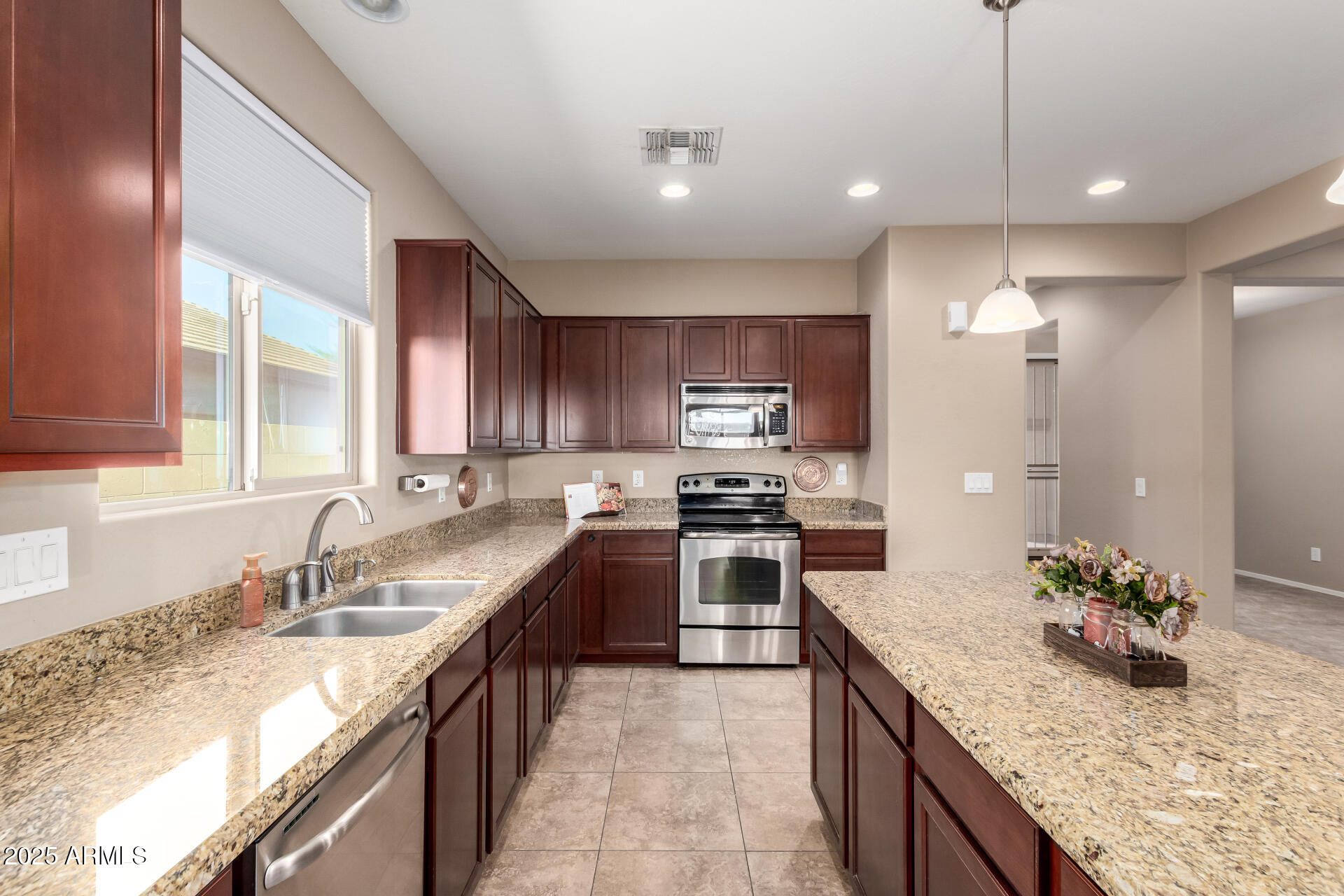 16093 West Almeria Road Goodyear, AZ 85395 - Photo 11 of 38 Lots of cabinets
