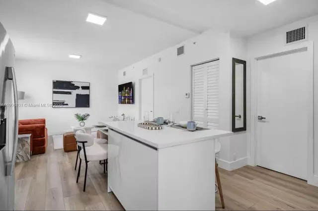a view of a dining room with furniture
