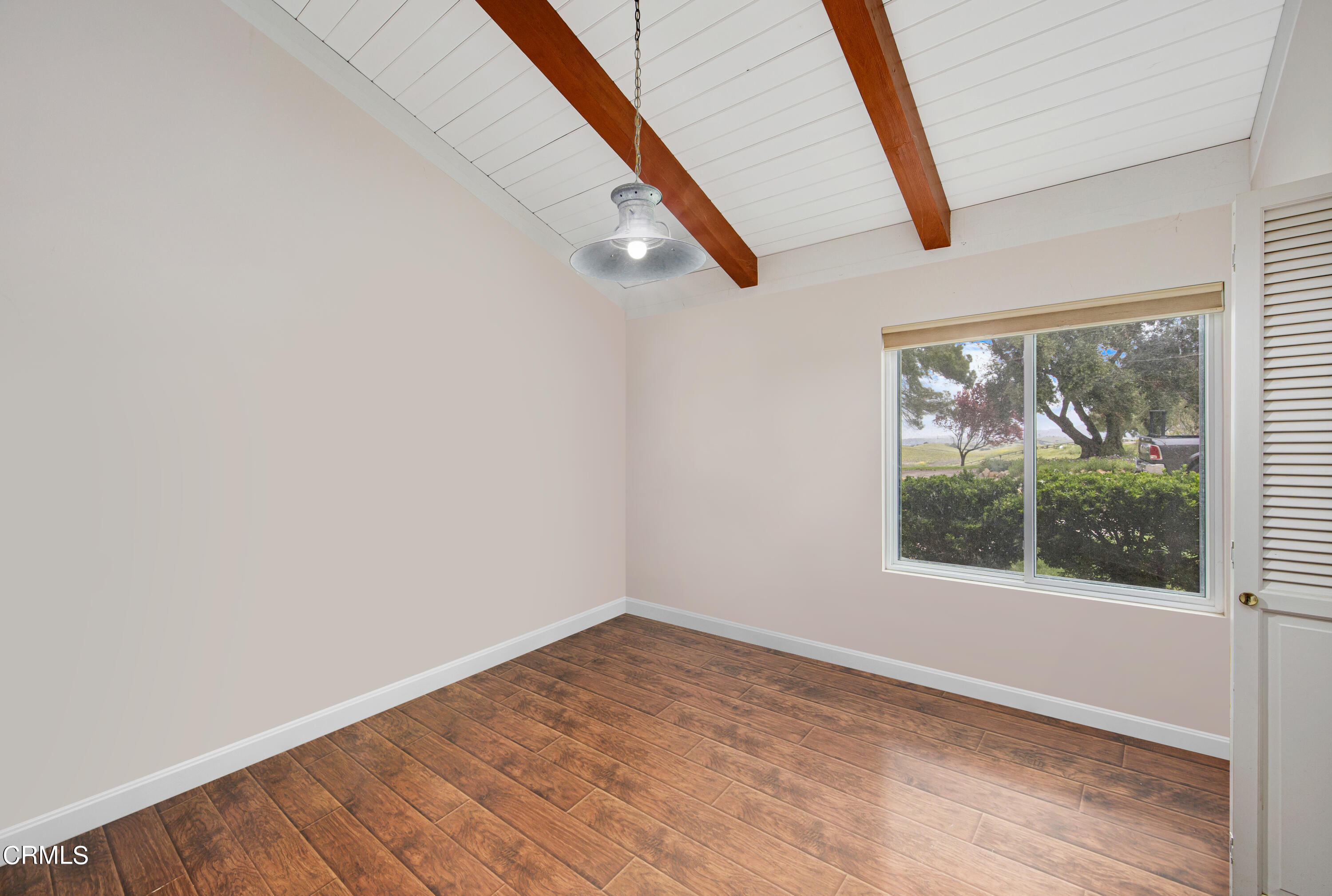 2851 Tapadero Road Solvang, CA 93463 - Photo 21 of 38 a view of empty room with wooden floor and fan