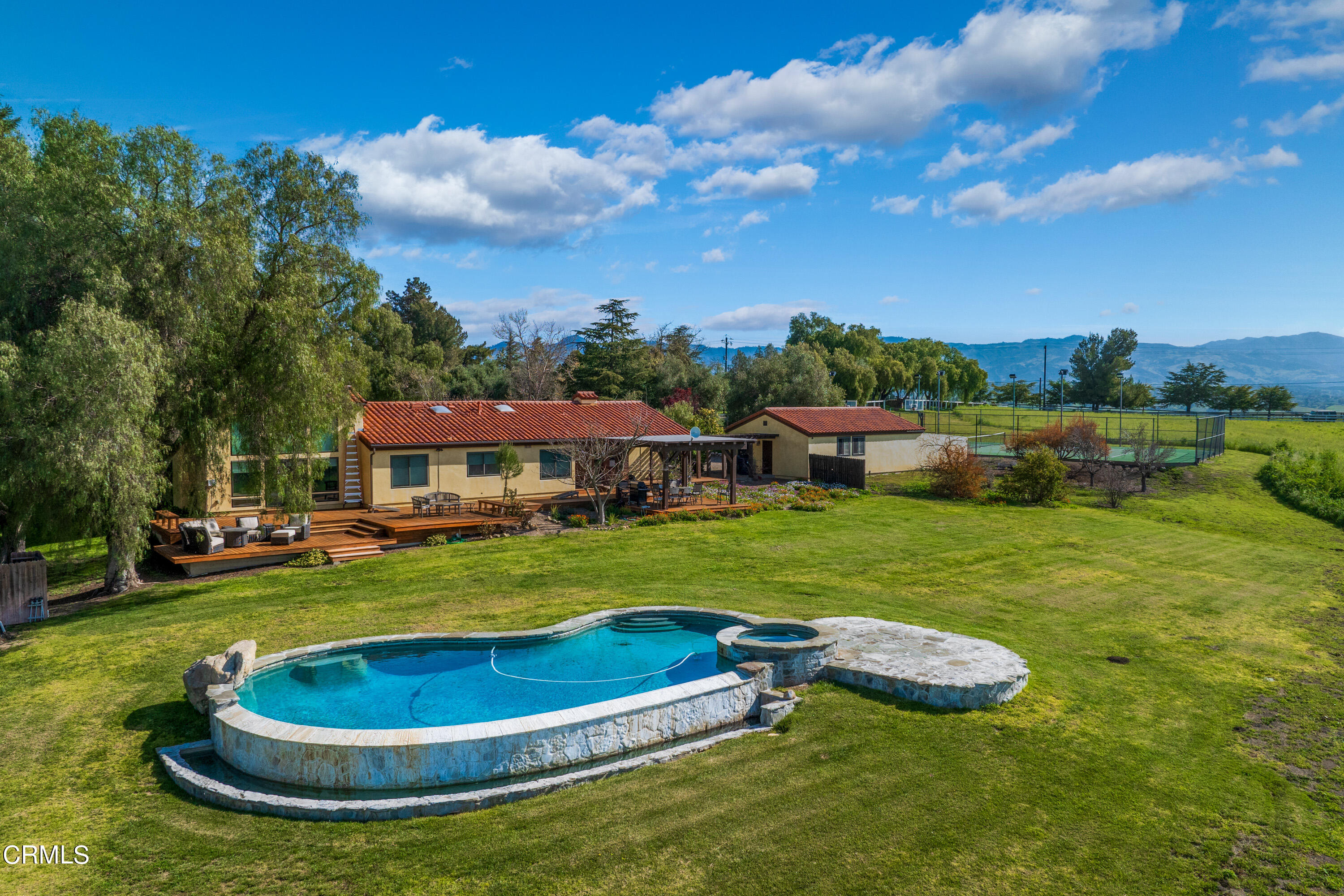 2851 Tapadero Road Solvang, CA 93463 - Photo 25 of 38 a view of a swimming pool and front of house