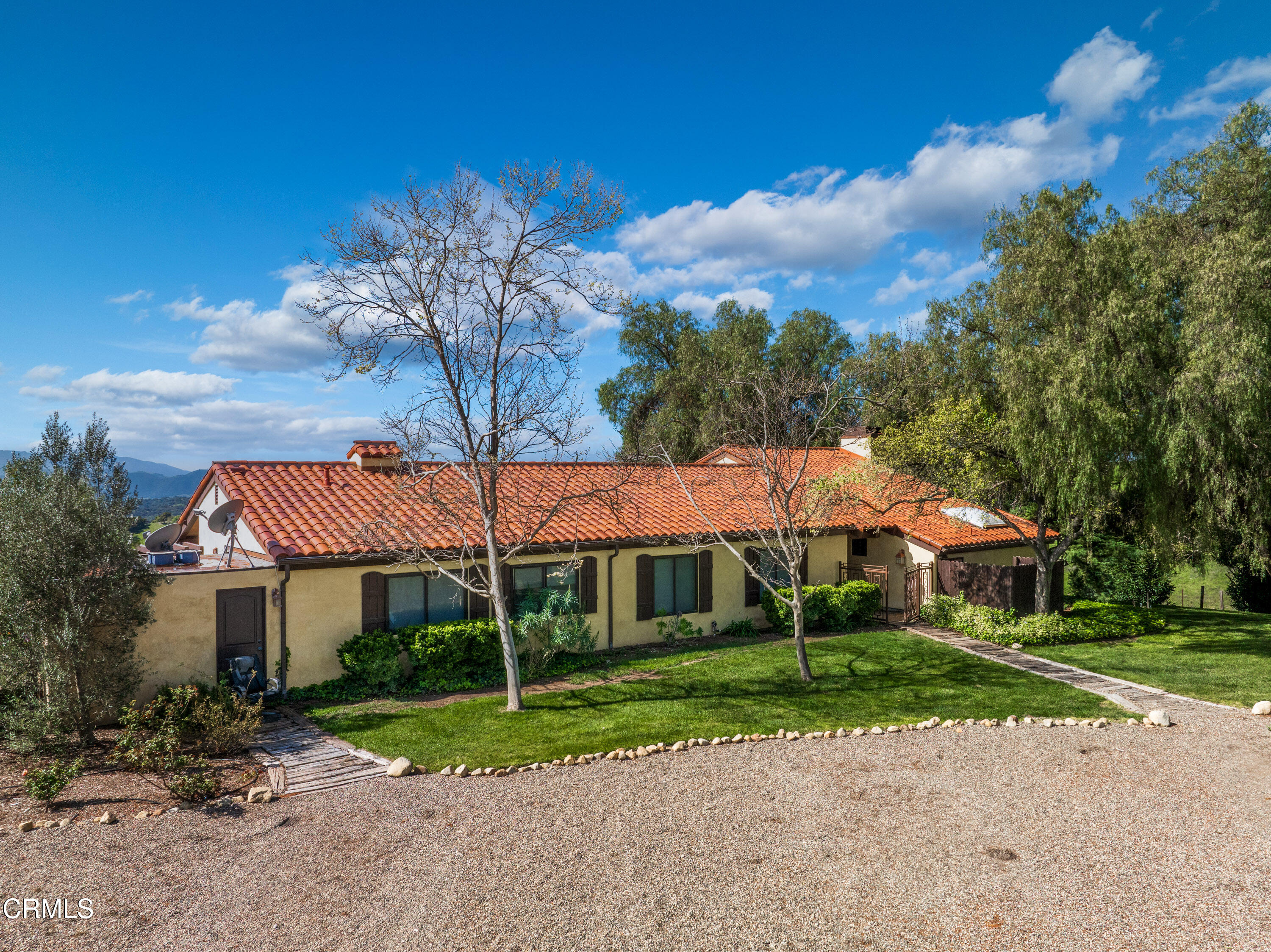 2851 Tapadero Road Solvang, CA 93463 - Photo 6 of 38 a view of a white house with a yard