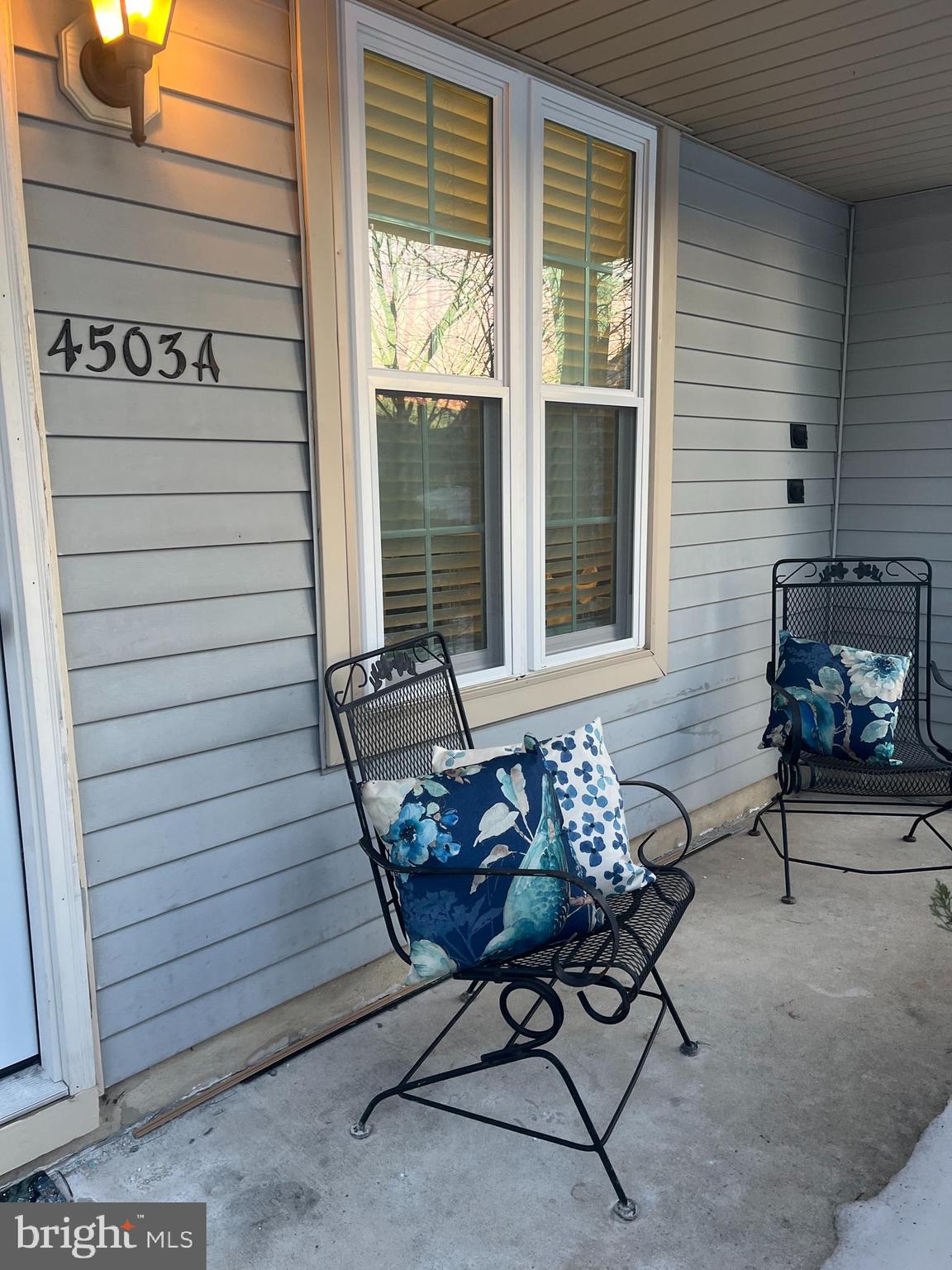 a building outdoor space with patio furniture