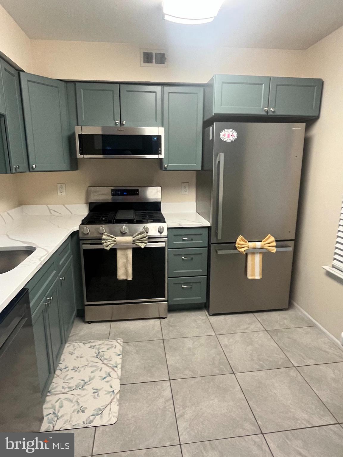 4503A Albridge Way Mount Laurel, NJ 08054 - Photo 2 of 15 a kitchen with a stove and a refrigerator