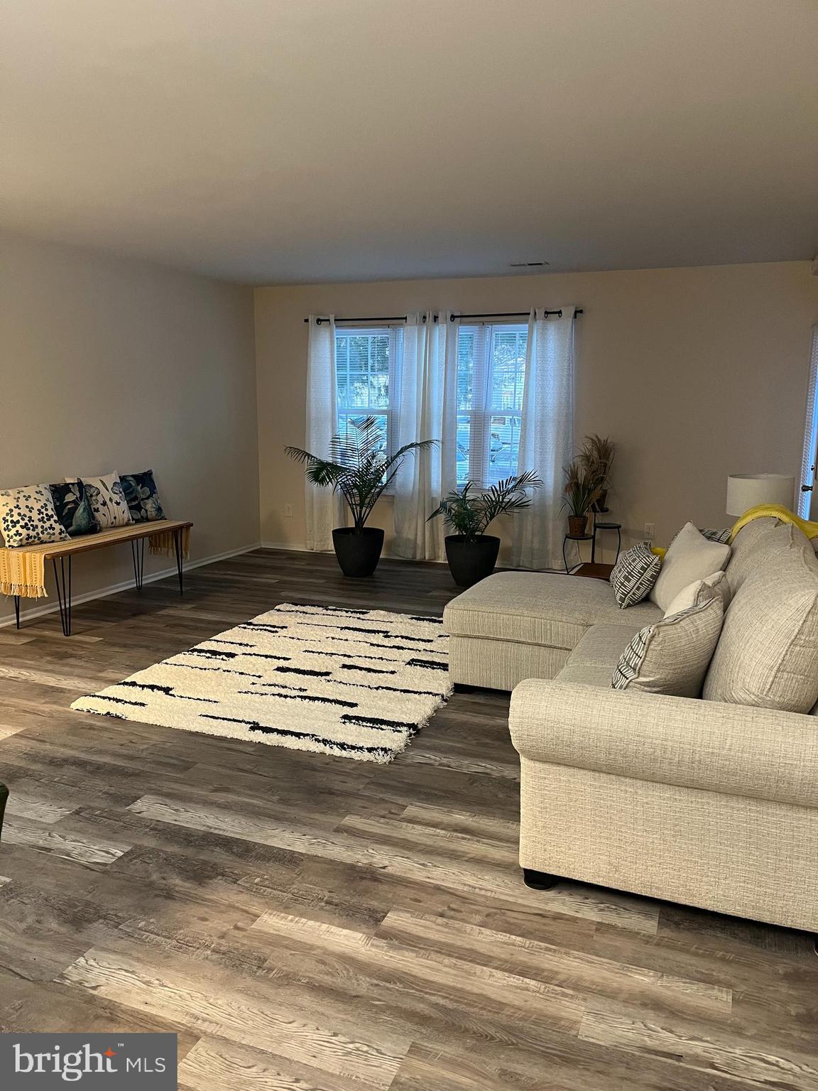 4503A Albridge Way Mount Laurel, NJ 08054 - Photo 7 of 15 a living room with furniture window and a wooden floor