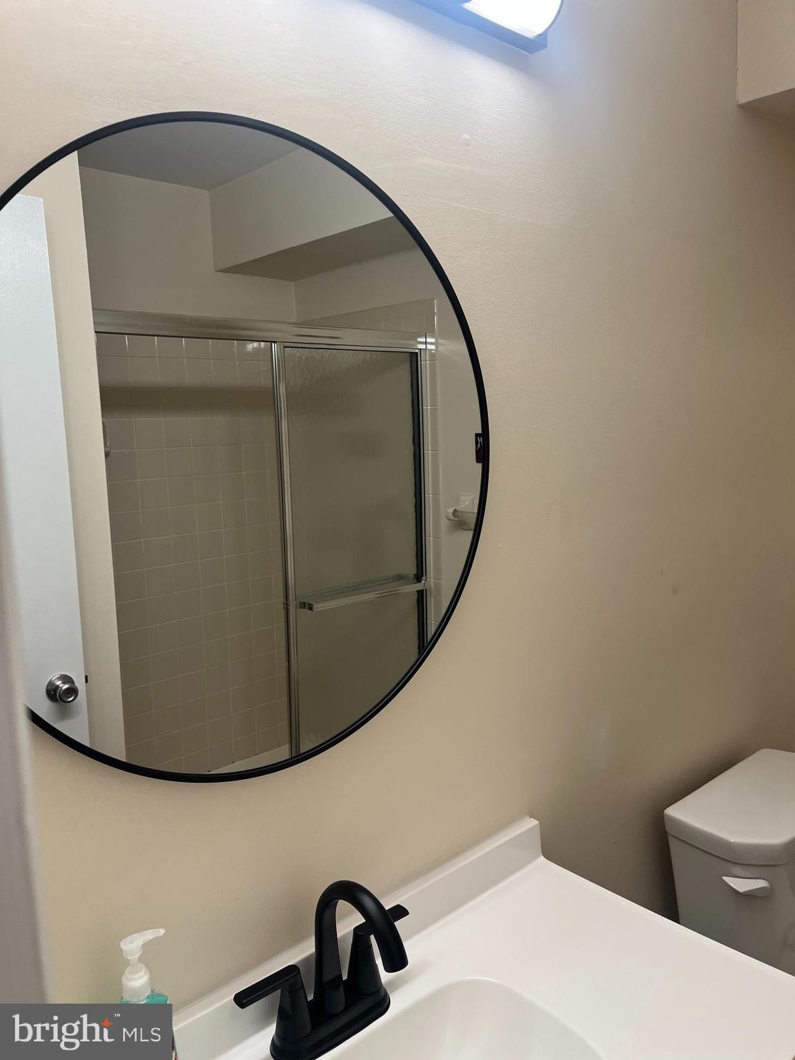 4503A Albridge Way Mount Laurel, NJ 08054 - Photo 10 of 15 a bathroom with a sink and mirror