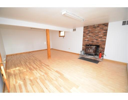 127 Leverett Road Amherst, MA 01002 - Photo 21 of 30 a view of empty room with a fireplace
