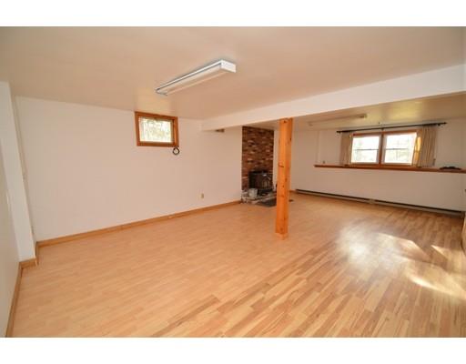 127 Leverett Road Amherst, MA 01002 - Photo 23 of 30 a view of an empty room with wooden floor