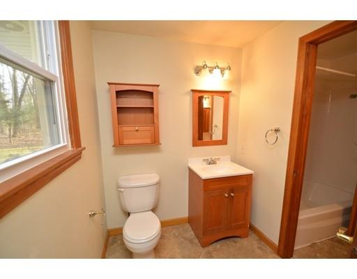 127 Leverett Road Amherst, MA 01002 - Photo 26 of 30 a bathroom with a toilet sink and mirror