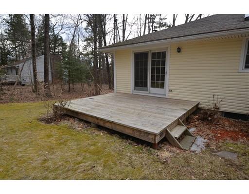 127 Leverett Road Amherst, MA 01002 - Photo 29 of 30 a view of a wooden floor and a table in the backyard