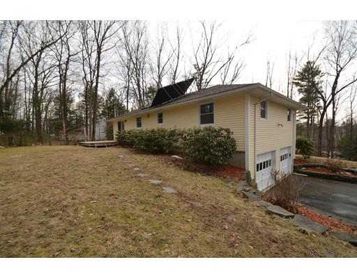 127 Leverett Road Amherst, MA 01002 - Photo 3 of 30 a white house that has a tree in front of it
