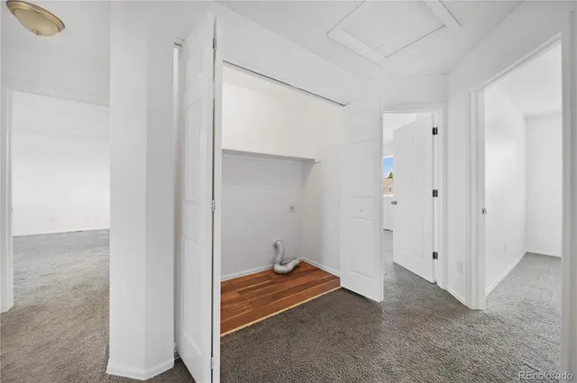 a view of a livingroom with wooden floor