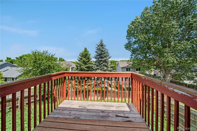 a view of a wooden house with a large window