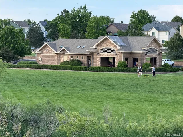 a view of outdoor space with deck and green space