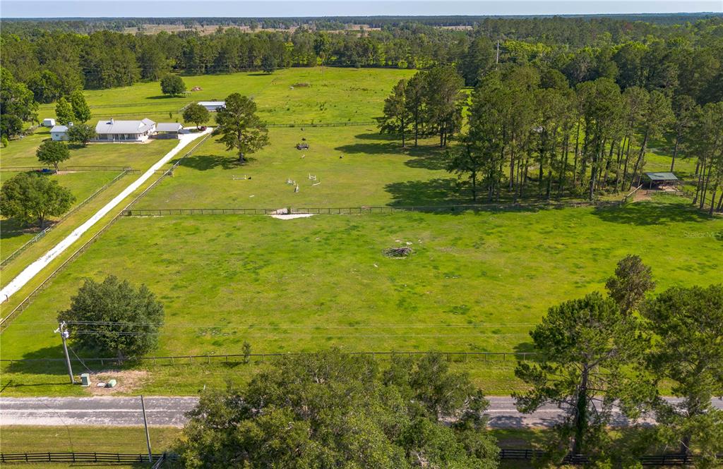 Tbd Northwest 185th Street Williston, FL 32696 - Photo 12 of 14 a view of a lake with houses