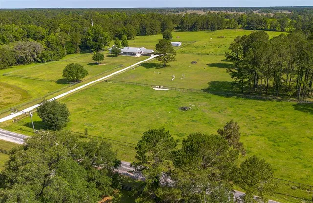a view of a lake with a yard