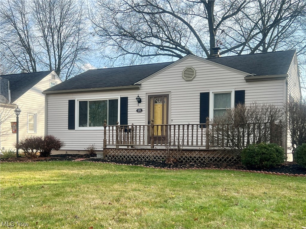 229 Hilliard Road Elyria, OH 44035 - Photo 1 of 28 View of front of property with a front yard and a wooden deck