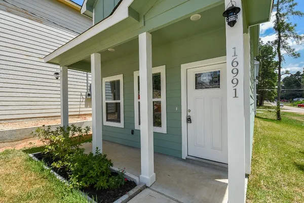 a view of a porch with garden