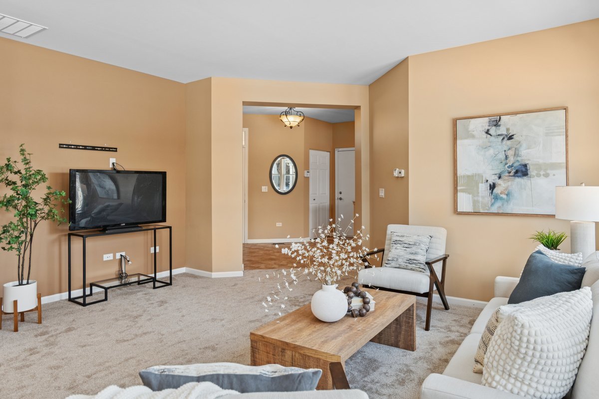 2905 Normandy Circle Naperville, IL 60564 - Photo 11 of 45 a living room with furniture and a flat screen tv