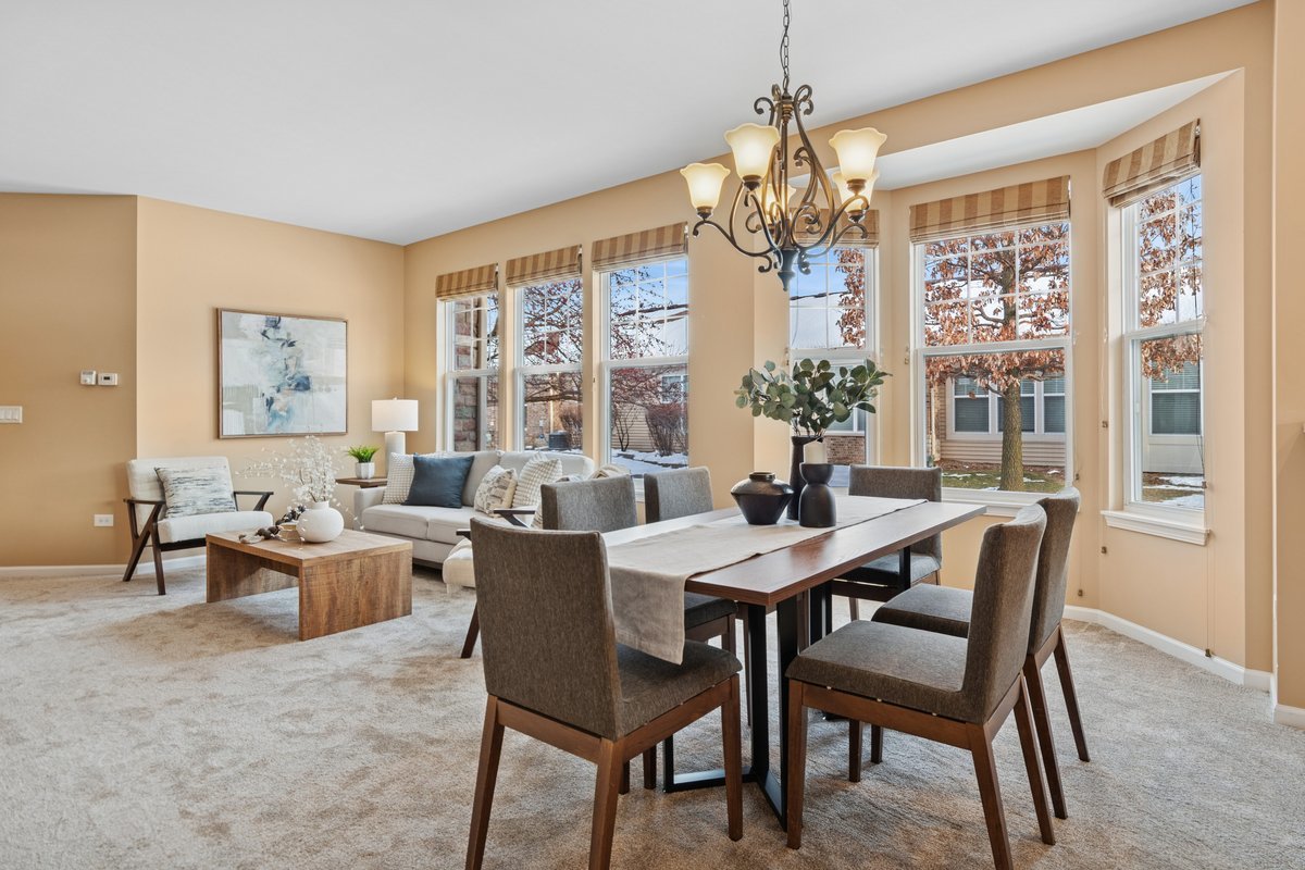 2905 Normandy Circle Naperville, IL 60564 - Photo 12 of 45 a view of a dining room with furniture window and outside view