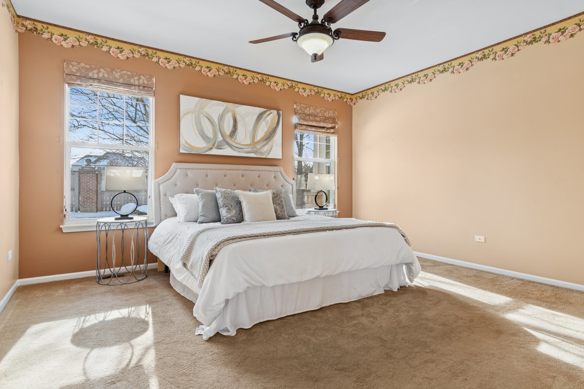 2905 Normandy Circle Naperville, IL 60564 - Photo 13 of 45 a bedroom with a bed and window