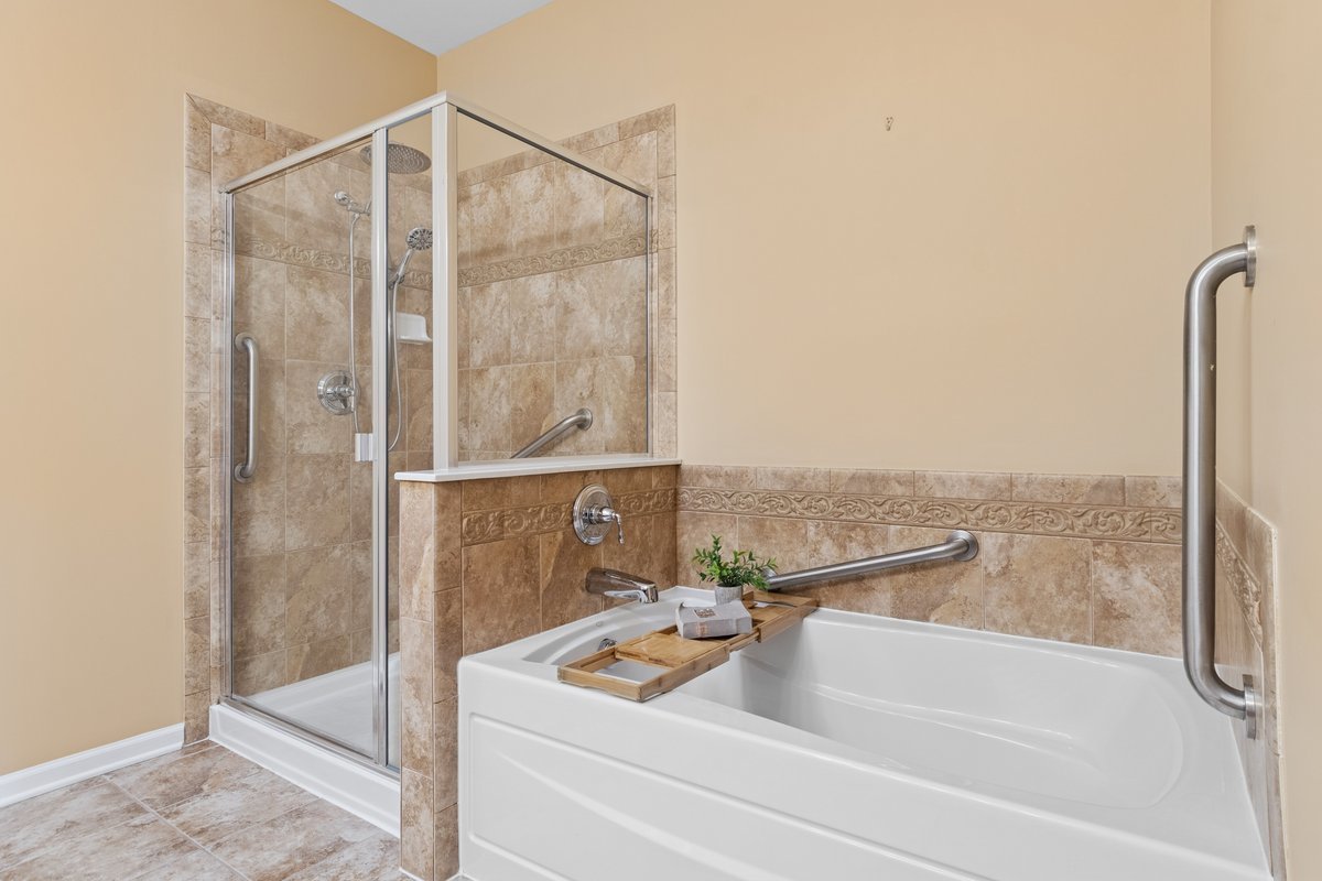 2905 Normandy Circle Naperville, IL 60564 - Photo 15 of 45 a bathroom with a tub and shower