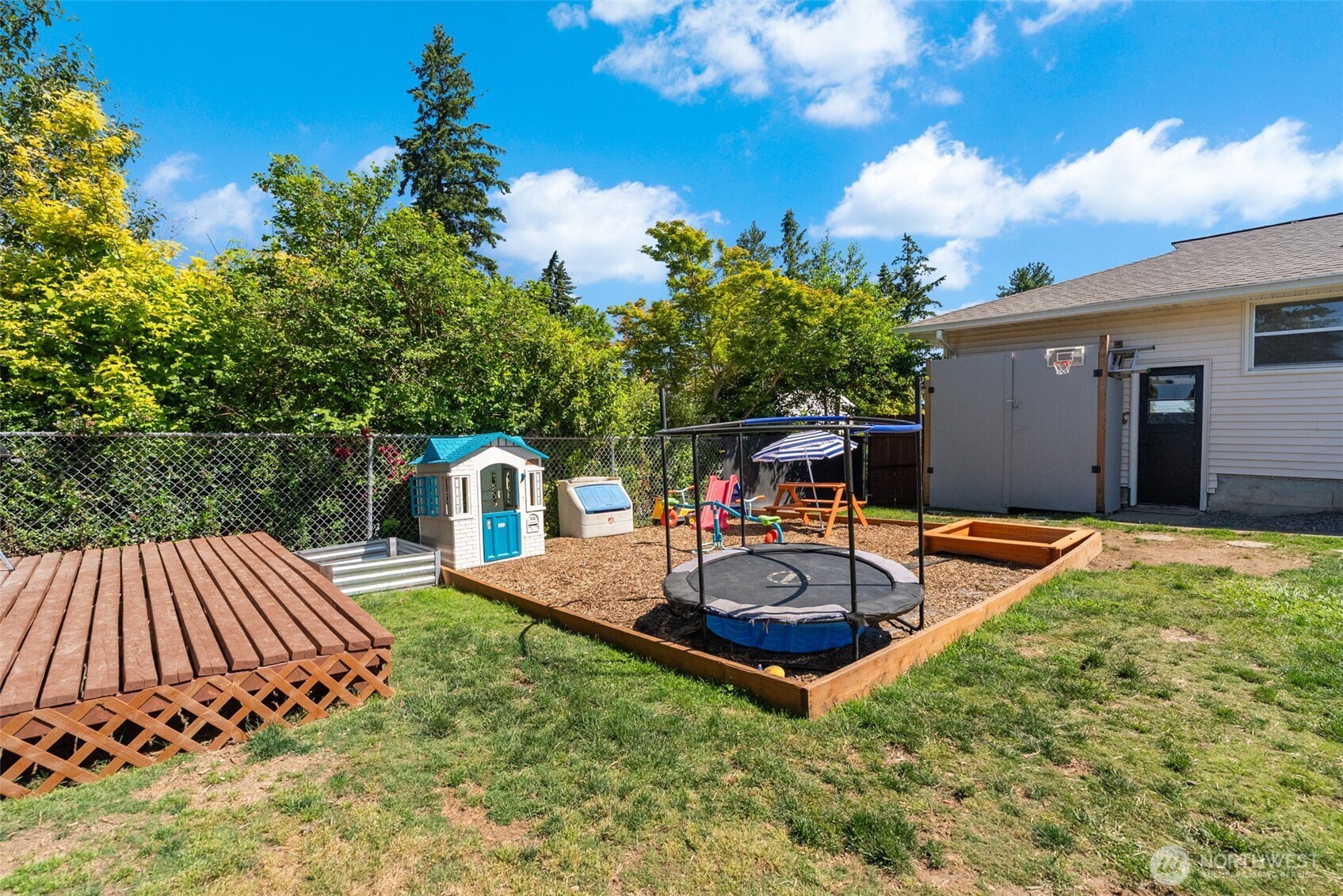 2710 Holman Street Bremerton, WA 98310 - Photo 22 of 25 a view of a backyard with sitting area