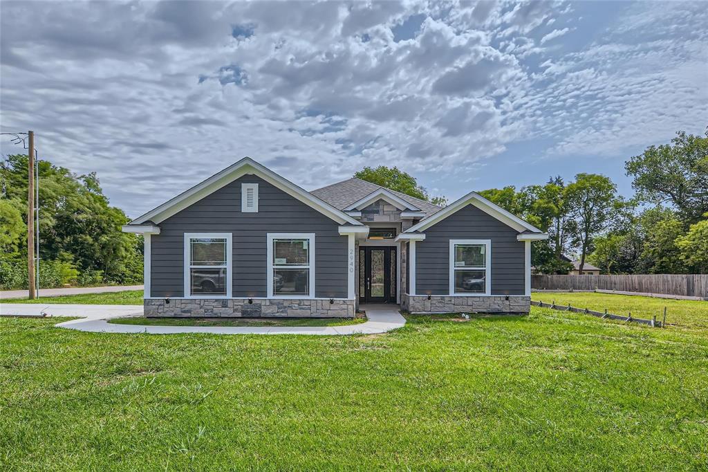 2940 Henry Road Lancaster, TX 75134 - Photo 1 of 10 a view of a house with a yard and wooden fence