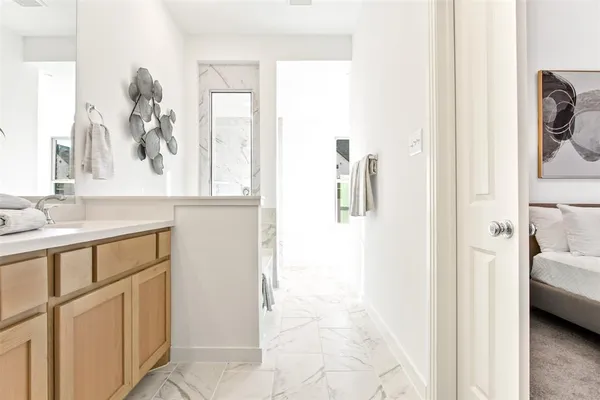 a view of a bedroom from a hallway