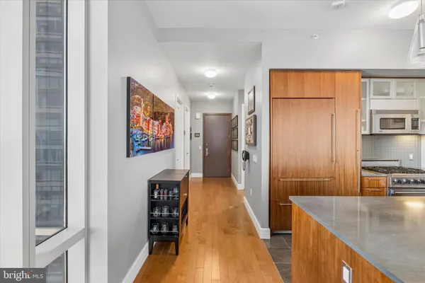 a view of a kitchen from the hallway