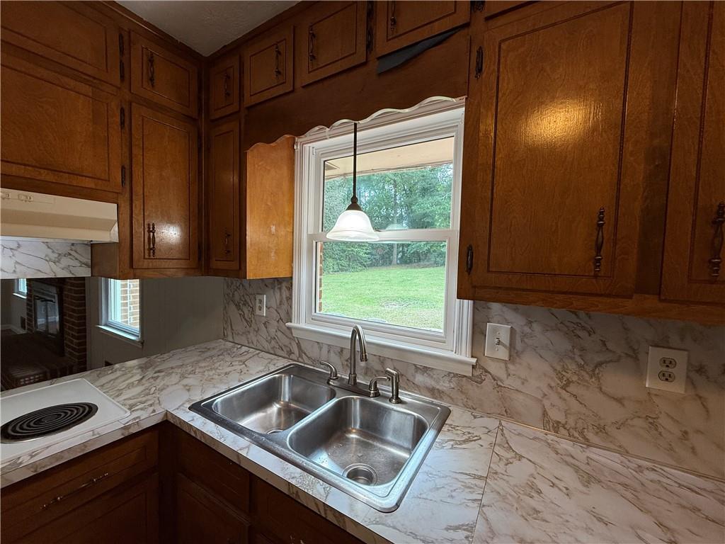 3155 Oak Drive Lawrenceville, GA 30044 - Photo 18 of 46 a kitchen with a sink and a refrigerator