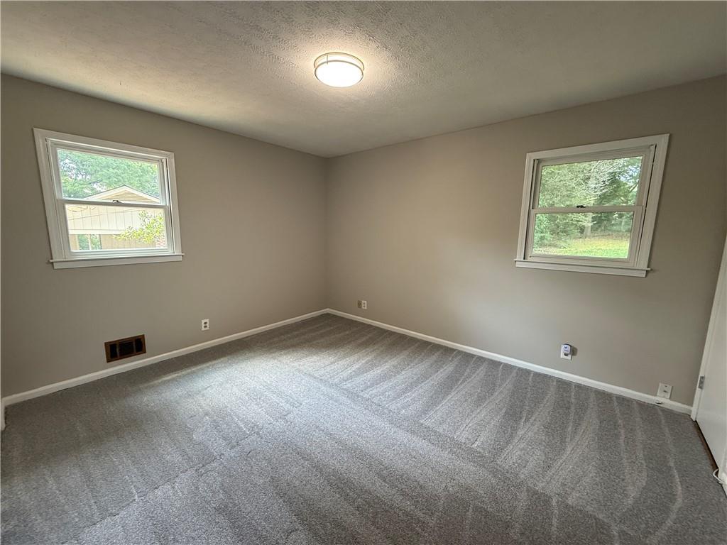 3155 Oak Drive Lawrenceville, GA 30044 - Photo 2 of 46 a view of an empty room with a window