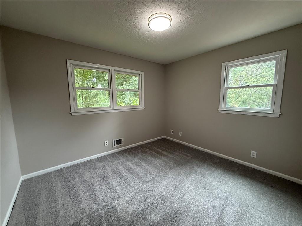 3155 Oak Drive Lawrenceville, GA 30044 - Photo 37 of 46 an empty room with a window