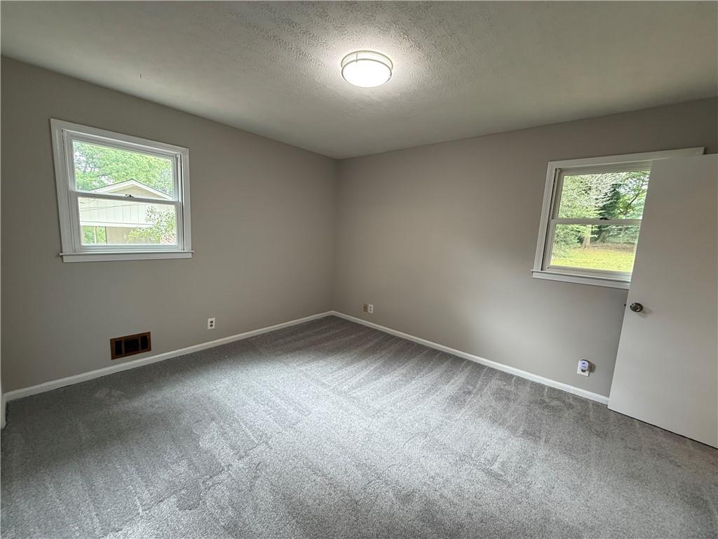 3155 Oak Drive Lawrenceville, GA 30044 - Photo 39 of 46 an empty room with a window