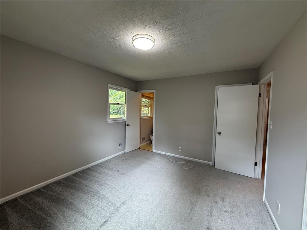 3155 Oak Drive Lawrenceville, GA 30044 - Photo 40 of 46 an empty room with windows