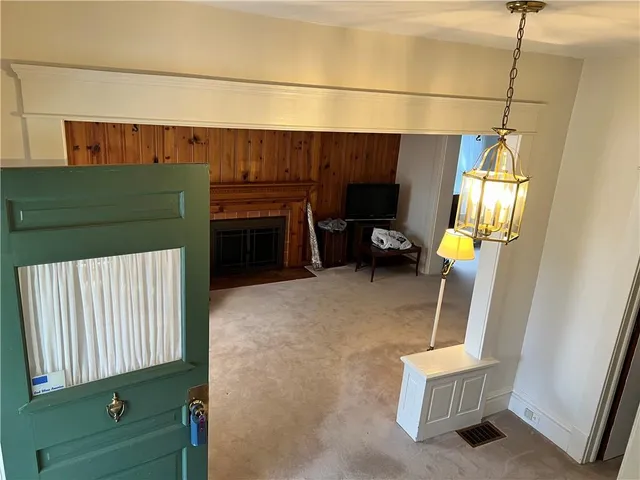 a view of livingroom with furniture and staircase