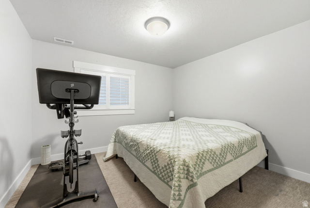 1405 Vintry Lane Murray, UT 84121 - Photo 30 of 44 Carpeted room with light grey walls and a window featuring white blinds
