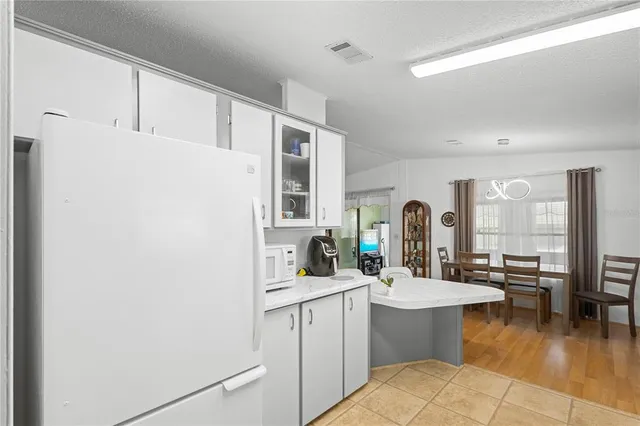 a bathroom with a sink double vanity and a mirror