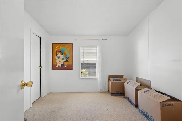 a view of a livingroom with furniture and windows